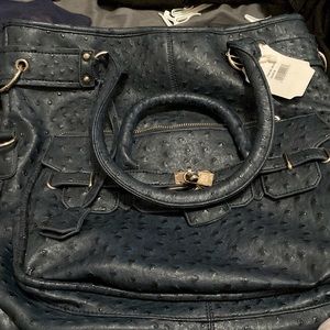 Beautiful never used perfect for what ever navy blue hand bag republic bag